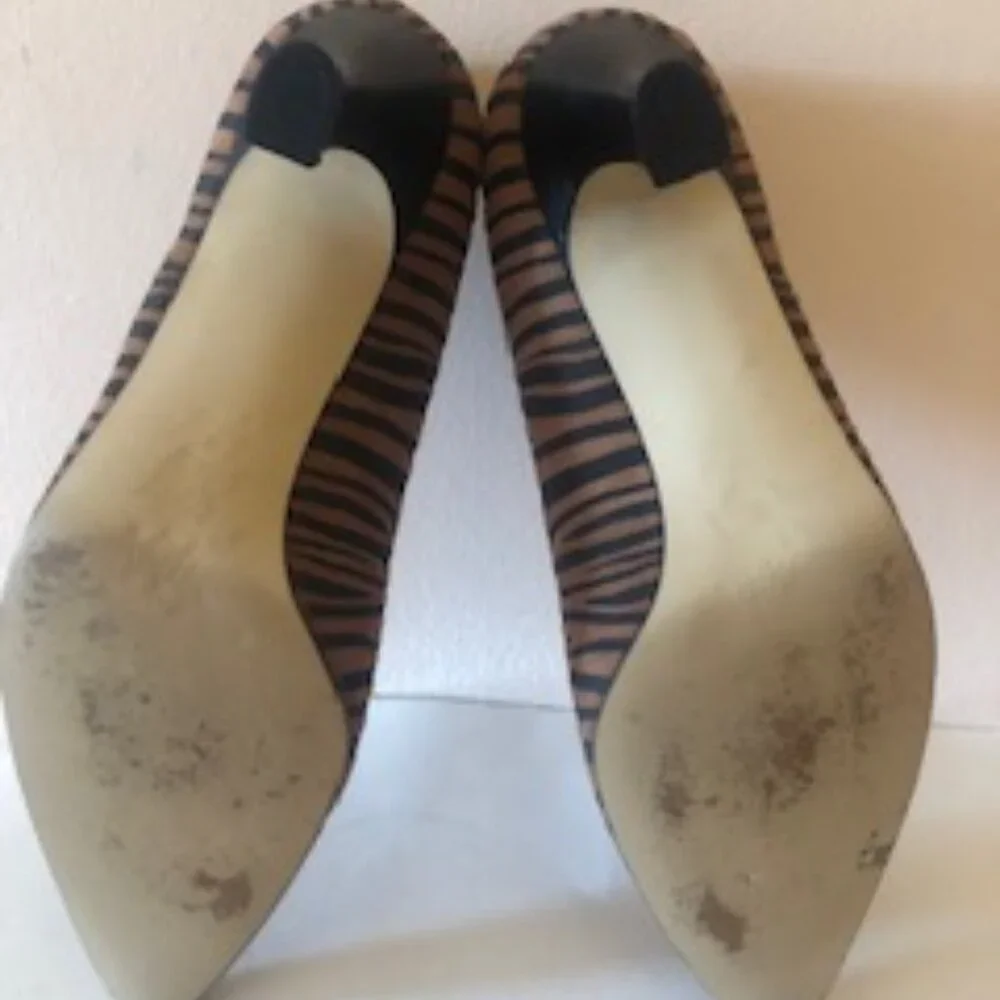 Fashion Influences Leopard print leather high heels. Size: 7.5